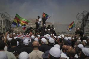 Israel strikes Syria’s capital, Damascus, pledging to defend Druze minorities
